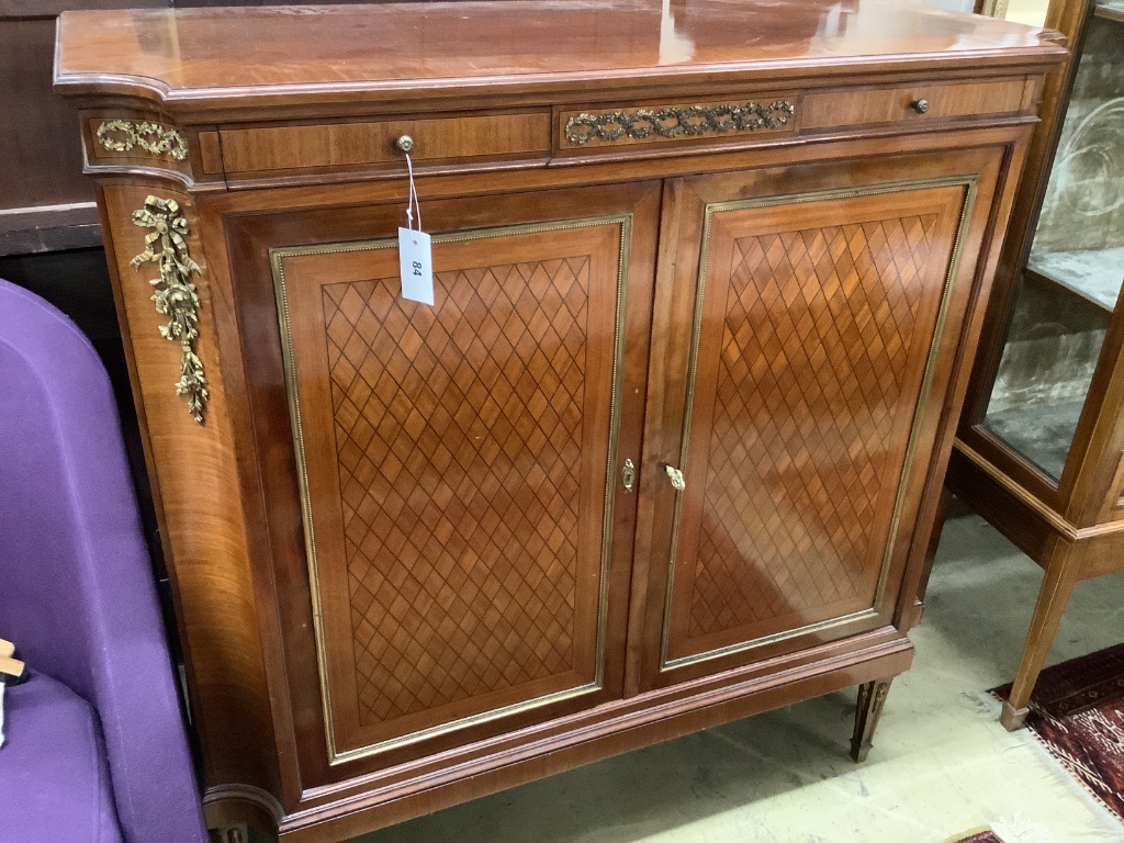 A Louis XVI style gilt metal mounted mahogany side cabinet, width 110cm depth 46cm height 110cm